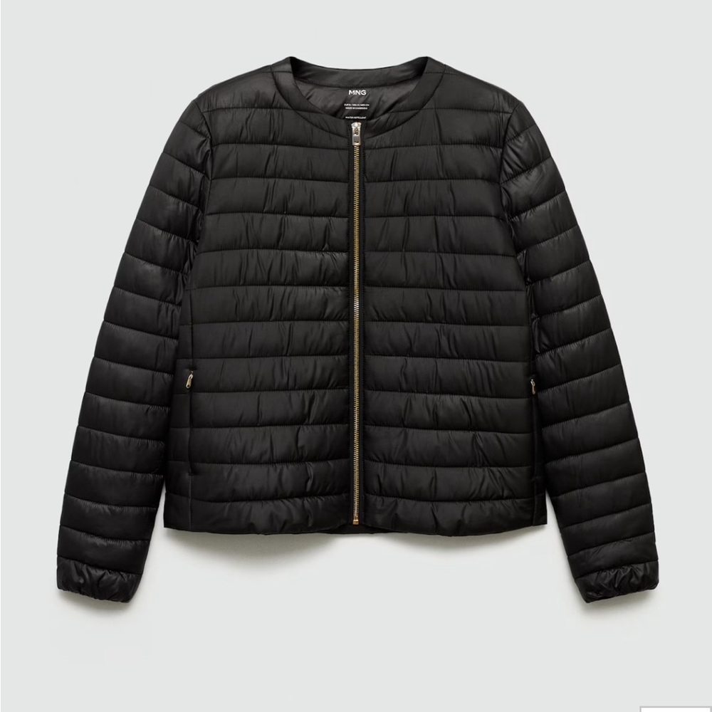 Black puffer jacket. Never worn. Pocket quilted jacket.